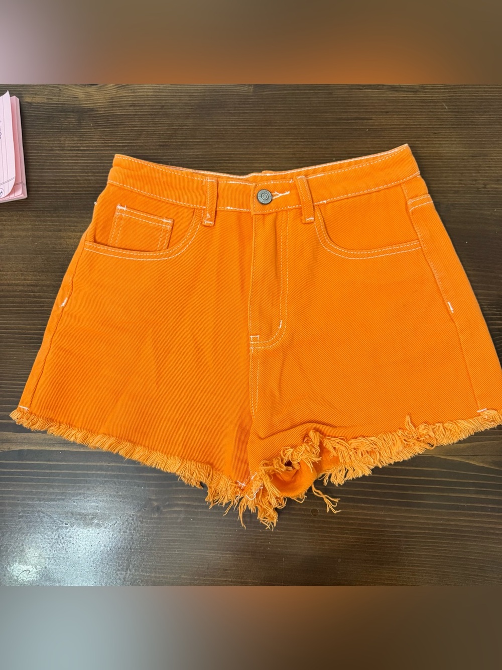 Orange denim shorts. XS